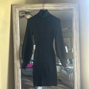 Pink Lily ribbed turtleneck sweater Dress in black.